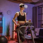 Caucasian woman doing fitness exercise, running on treadmill using virtual reality glasses