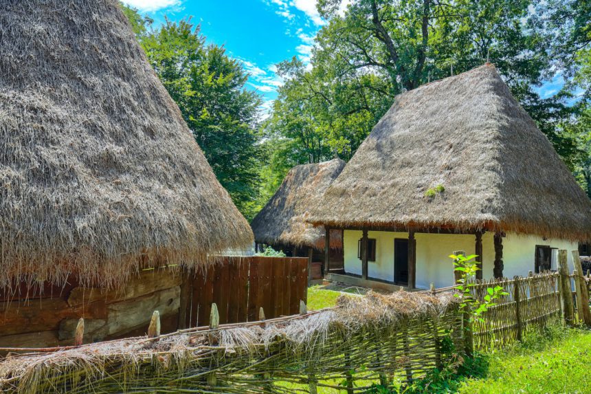 View of traditional romanian peasant houses in Transylvania, Romania.